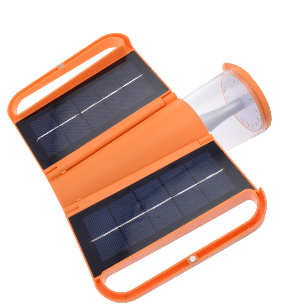 lampe autonome + chargeur solaire portable version orange avec chargeur ouvert ( lampe en charge)